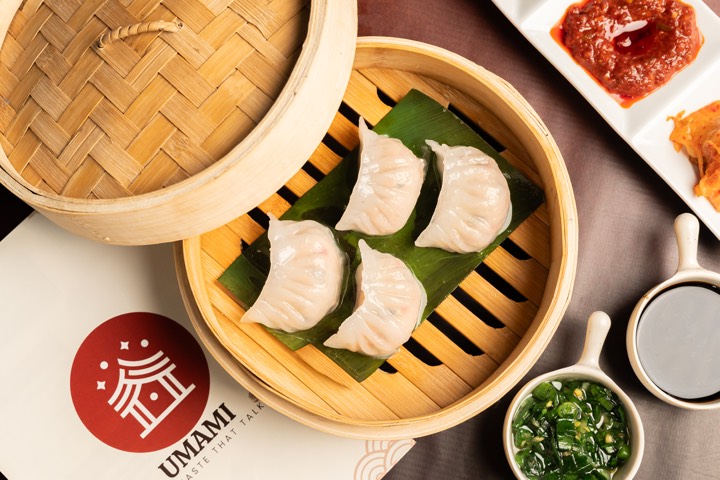 Dim sum in a bamboo steamer for Umami
